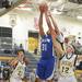Salems's Ahmad Khalid makes a rebound against Chelsea during Chelsea's holiday basketball tournament on Thursday Dec. 27th.
Courtney Sacco I AnnArbor.com 